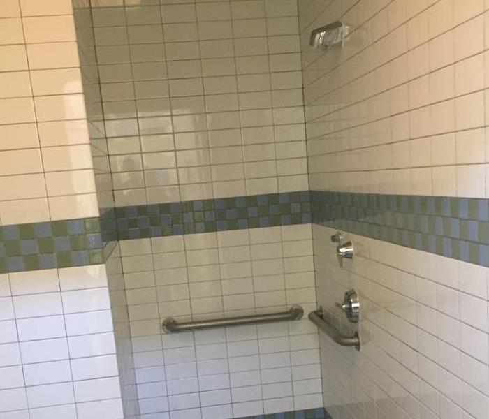 a shower with tile 