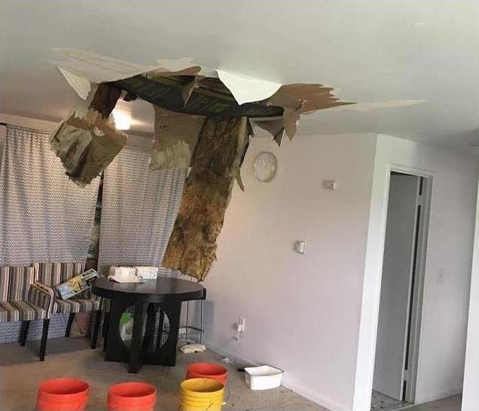 whole on ceiling due to water damage